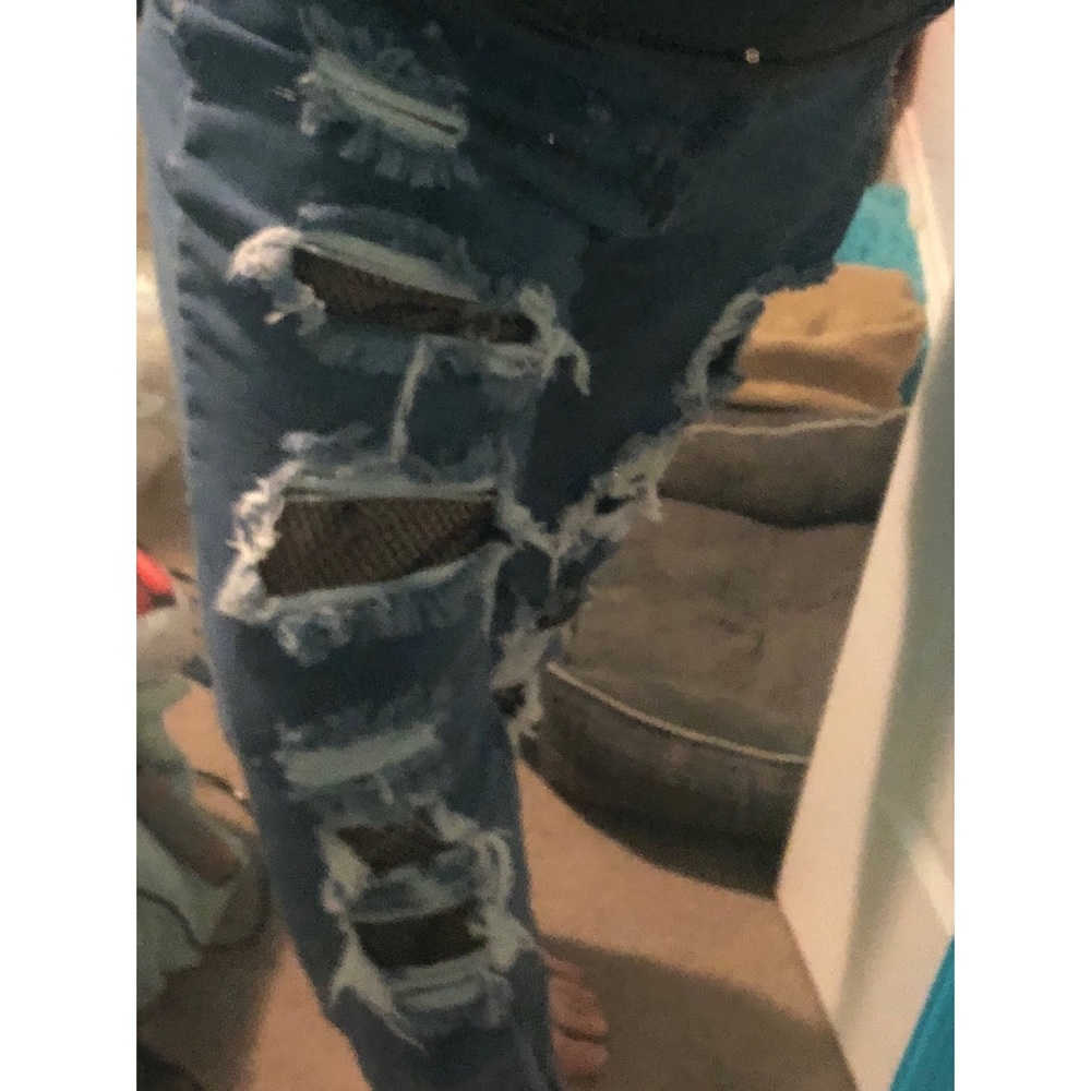 Fishnet ripped jeans